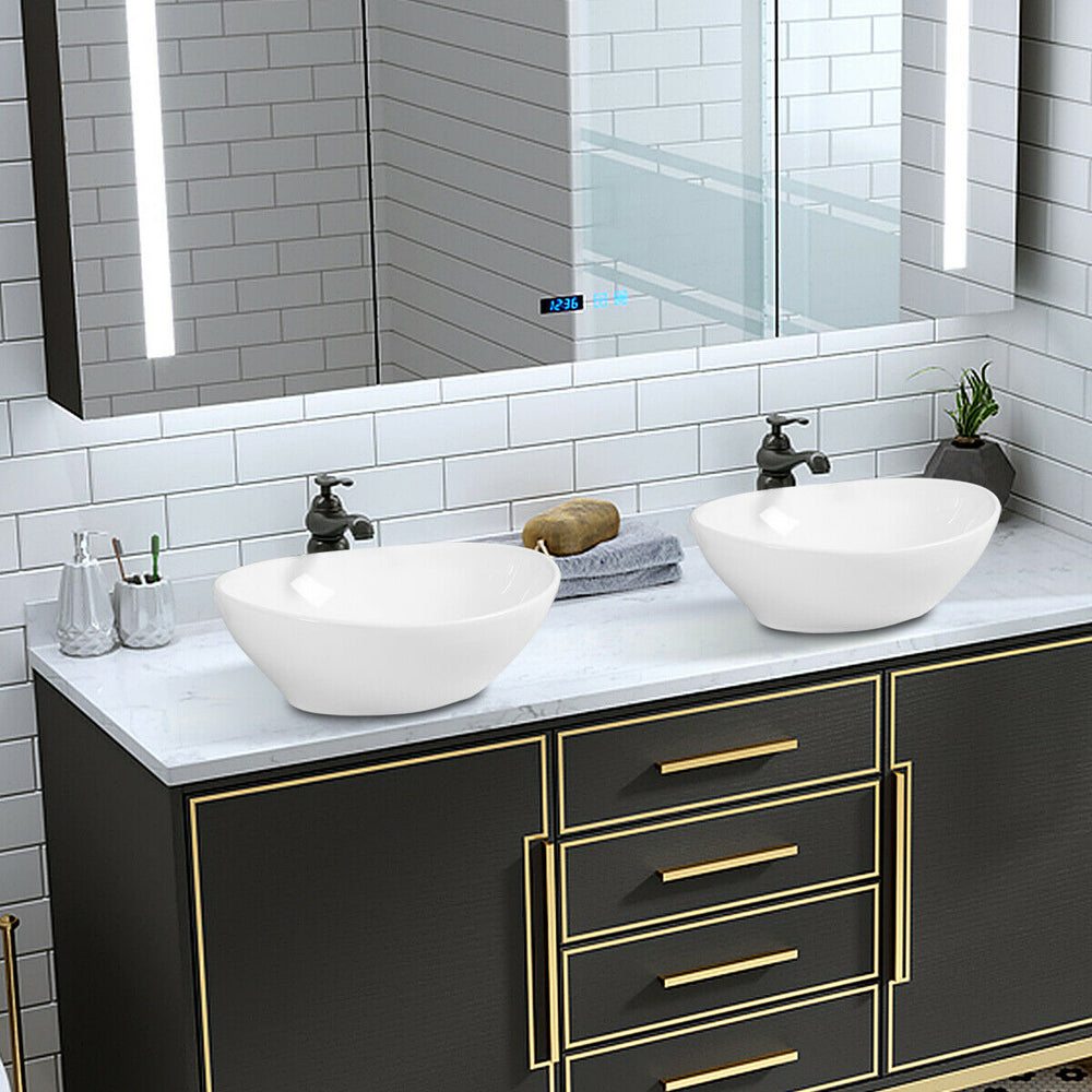 Contemporary oval ceramic vessel sinks with popup drain design, ideal for bathroom upgrades and aesthetic appeal.