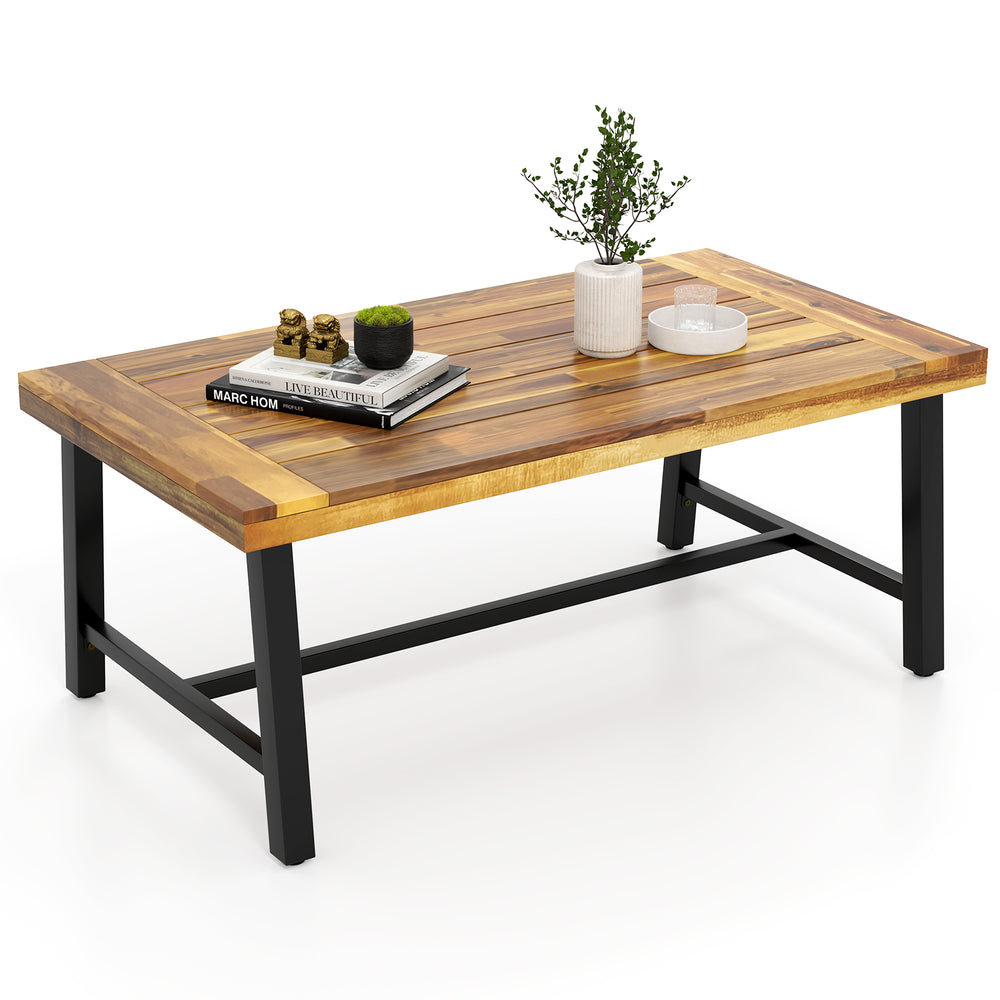 Acacia wood coffee table with a thickened top, showcasing a stunning oil-stained finish and sturdy metal legs for.