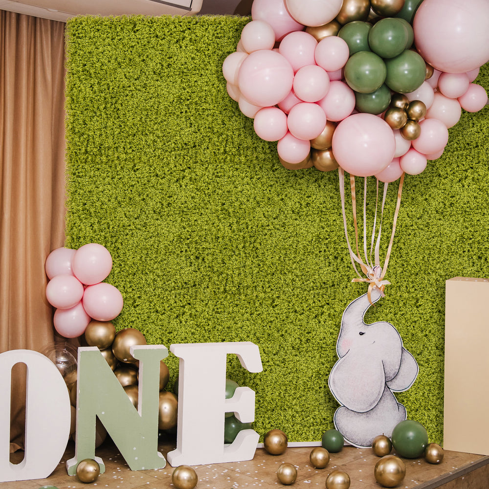 Artificial grass wall panels in light green, ideal for garden or party decor, showcasing a lush appearance and easy.