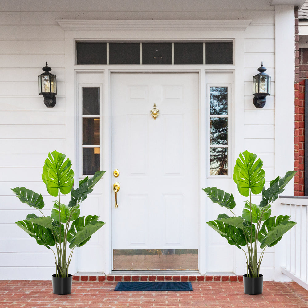 Two artificial Monstera Deliciosa trees with 10 leaves each, perfect for year-round indoor and outdoor decoration.