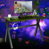 Ergonomic gaming desk with PVC carbon fiber surface, cup holder, headphone hook, and spacious tabletop for gaming setup.