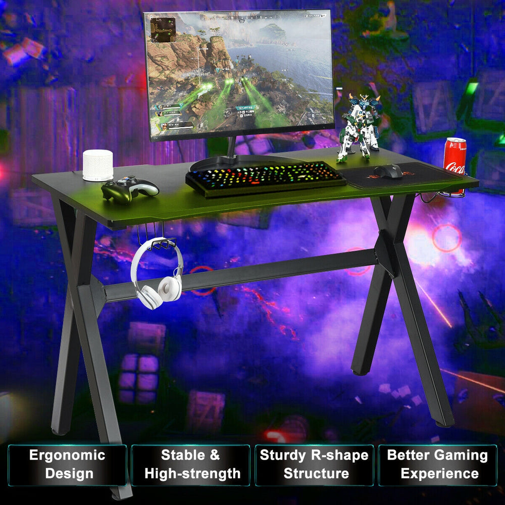 Ergonomic gaming desk with a spacious surface, cup holder, headphone hook, and sturdy X-shape steel frame for stability.