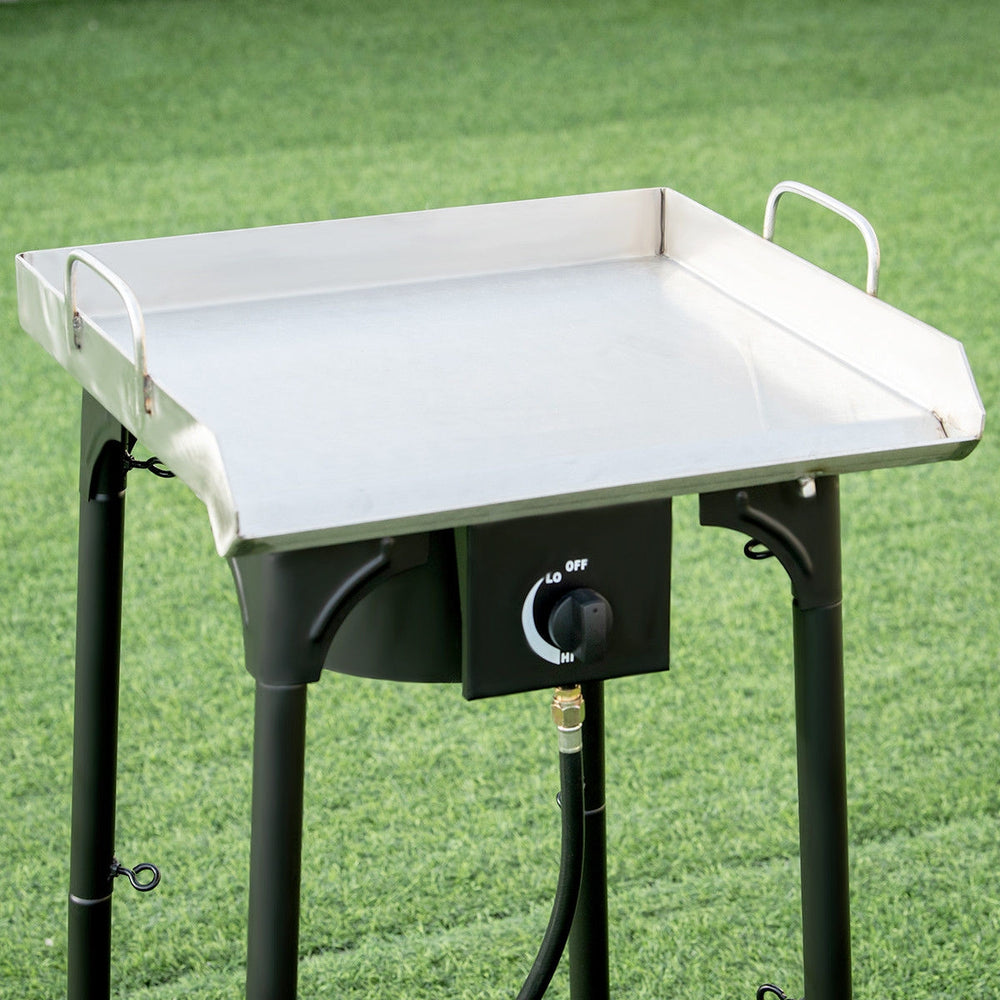 Portable propane camp stove with a sturdy cast iron head, adjustable legs, and a 100,000 BTU output for outdoor cooking.