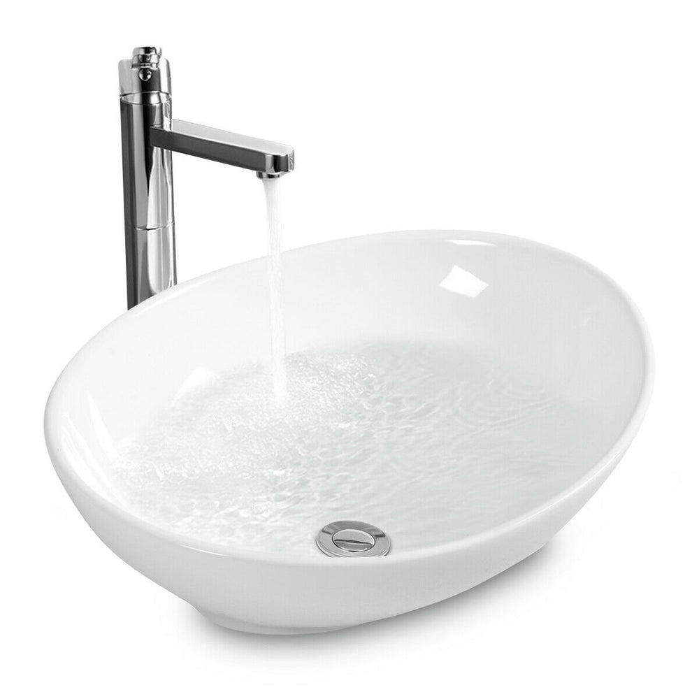 Contemporary oval ceramic vessel sink with popup drain, ideal for bathroom upgrades and aesthetic appeal.