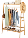 Bamboo clothing rack with storage shelves, featuring a hanging rod and two-tier shelves, ideal for bedroom or entryway.