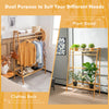 Bamboo clothing rack with storage shelves, featuring a hanging rod and two tiers, ideal for bedroom or plant display.