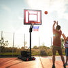 Basketball hoop with adjustable height, featuring a shatterproof backboard and stable base, ideal for indoor and.