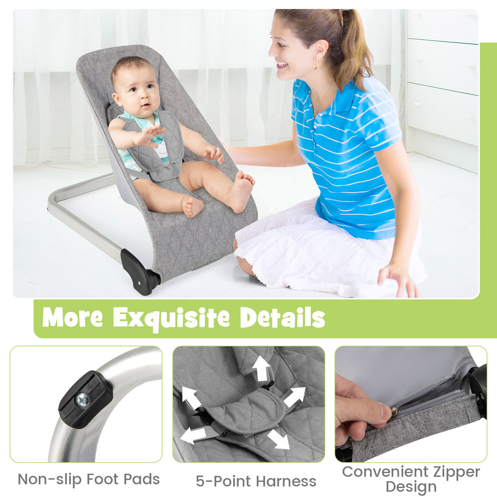 Light gray baby bouncer seat with 5-point harness and aluminum frame, designed for comfort and easy cleaning.