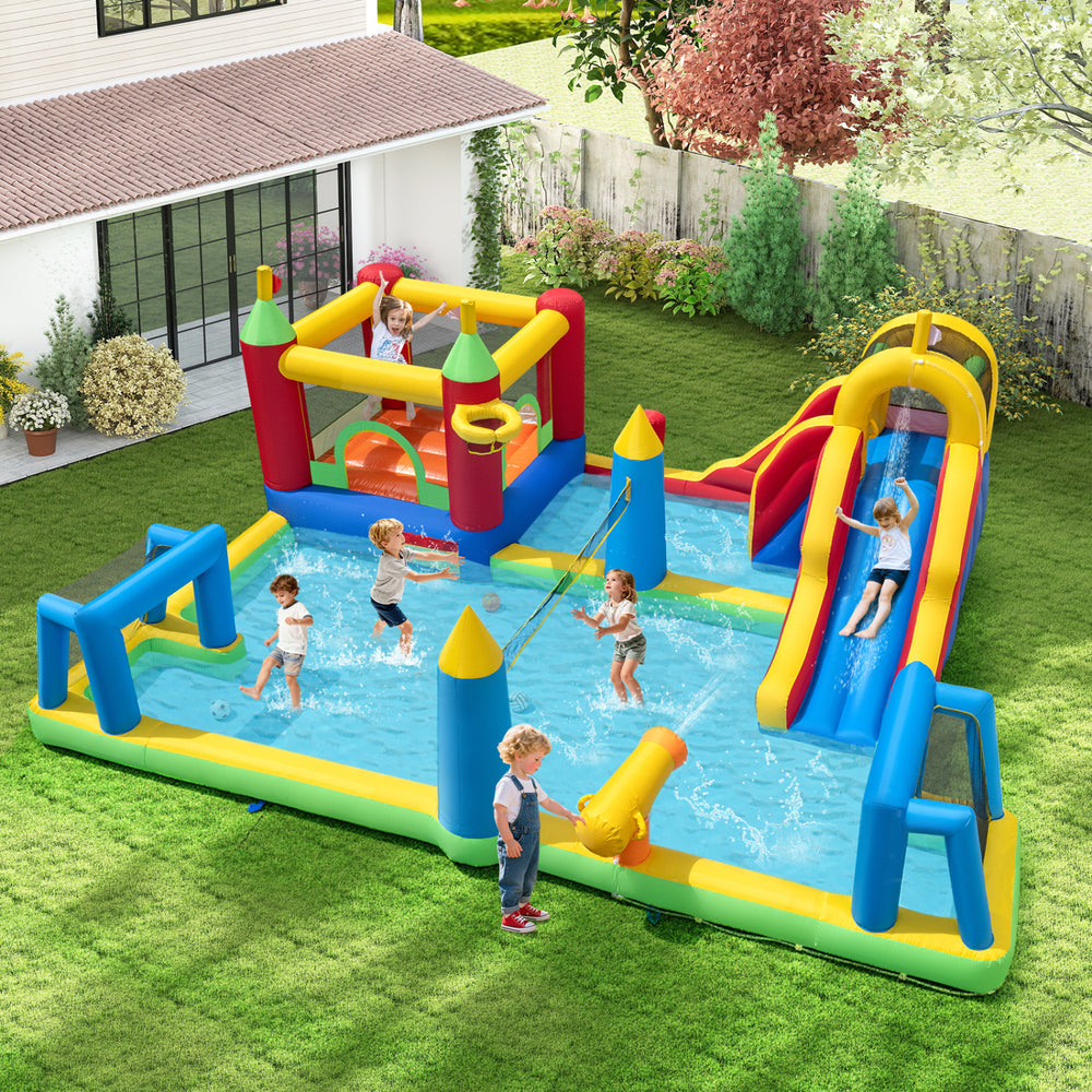 Colorful inflatable water slide bounce house featuring a climbing wall, slides, and various games for outdoor fun.