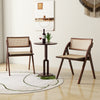 Foldable dining chairs set of 2 with woven rattan backrest in brown, featuring sturdy rubber wood frame for stability.