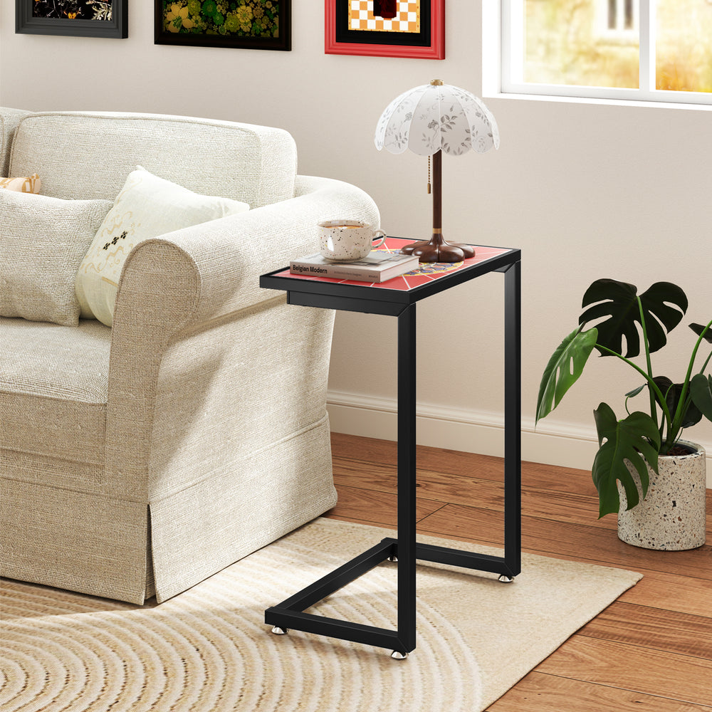 C-shaped side table with a ceramic top, featuring a retro design, perfect for indoor or outdoor use.