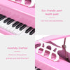 30-key pink mini grand piano with matching bench, crafted with eco-friendly paint for kids aged 1 to 7.