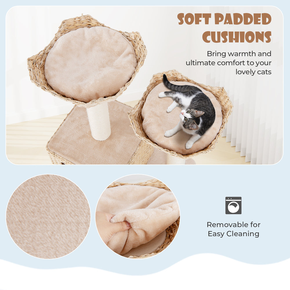 Soft padded cushions on the 48-inch beige cat tower, removable for easy cleaning, perfect for feline comfort and.