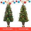 LED Christmas tree with red berries and pine cones, pre-lit with warm white lights, ideal for festive home decoration.