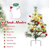 Pre-lit 2 feet flocked Christmas tree with 30 warm LED lights, 8 flash modes, and decorative pine cones and berries.