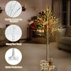 5-foot white twig birch tree with 72 LED lights, featuring a stable plastic base, perfect for secure indoor holiday.