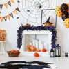 Flexible 9-foot black Halloween garland with 50 purple LED lights, designed for creative indoor and outdoor spooky.