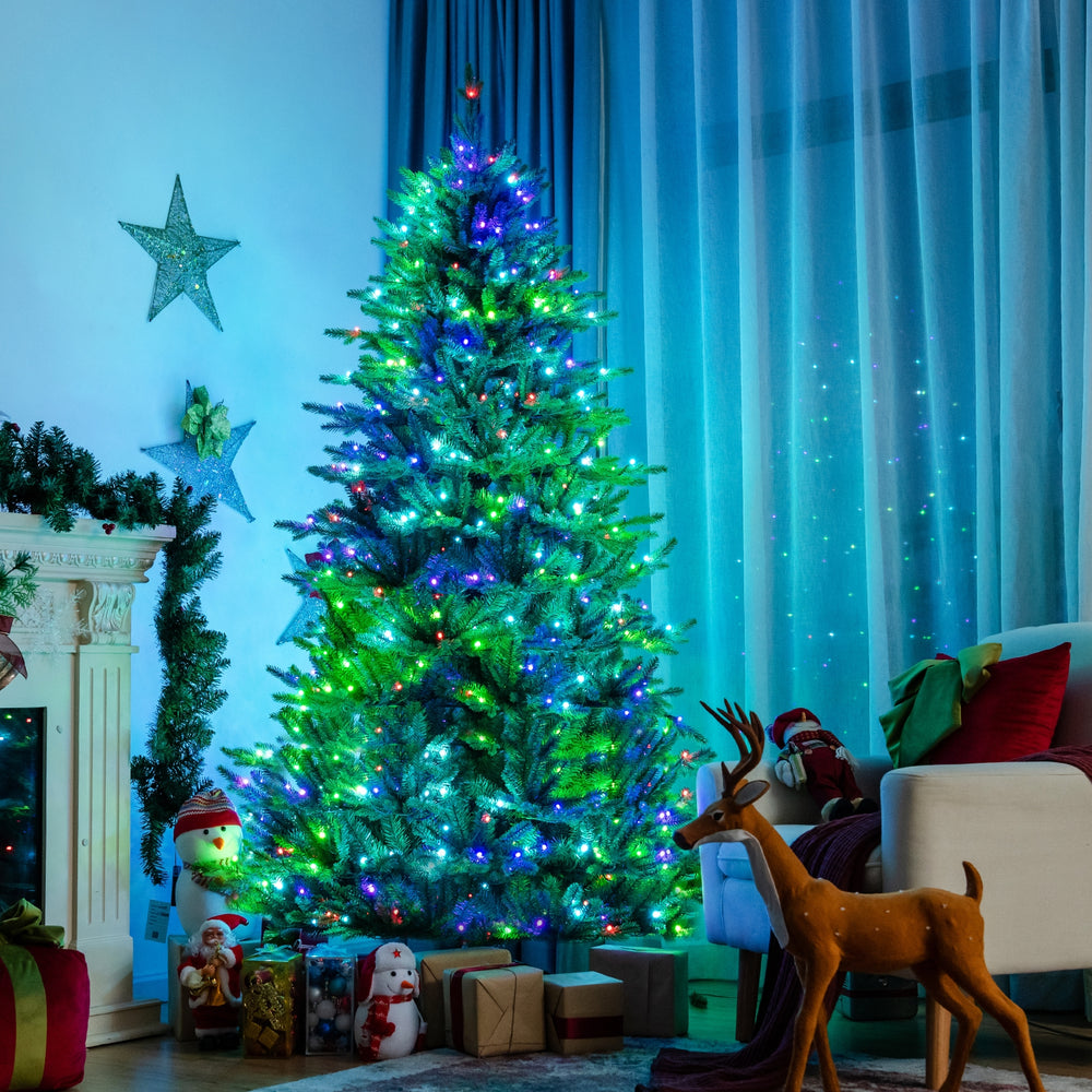 Pre-lit 7ft artificial Christmas tree with app-controlled LED lights, featuring colorful illumination and a full-bodied.