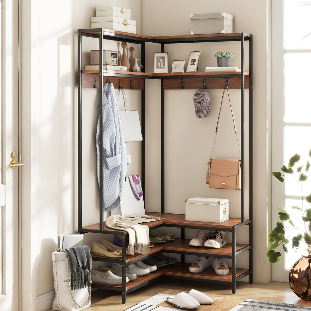 Corner garment rack with open shelves and 7 hooks in walnut finish, ideal for entryway organization and shoe storage.
