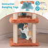 Cute monster-themed cat tower with plush hanging toys and sisal scratching post for playful and cozy cat adventures.