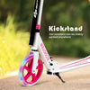 Portable folding sports kick scooter in pink with LED wheels, featuring a sturdy kickstand for stable parking.
