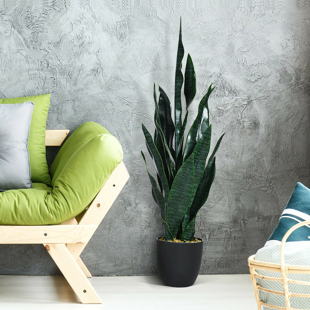 Indoor-outdoor artificial snake plant with 20 vivid green leaves in a sturdy pot, perfect for any decor style.