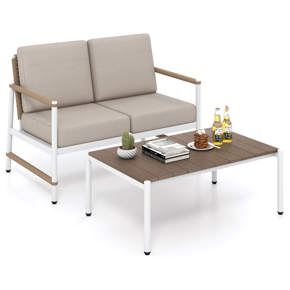 Patio loveseat sofa set with thick cushions and slatted PS tabletop, perfect for backyard or poolside relaxation.