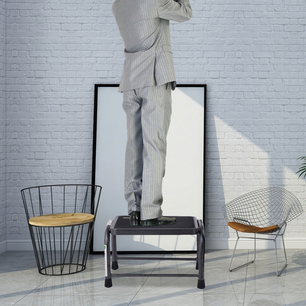 Heavy duty step stool with a large platform, non-slip design, and sturdy iron construction for home or office use.