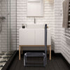 Heavy duty step stool with non-slip surface and handle, ideal for home and bathroom use, supporting up to 330 lbs.