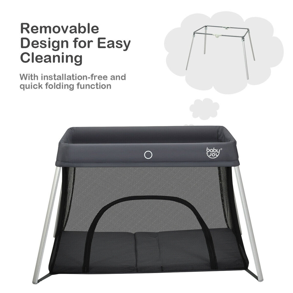 Lightweight foldable baby playpen in dark gray with breathable mesh, zipper door, and removable washable fabrics for.