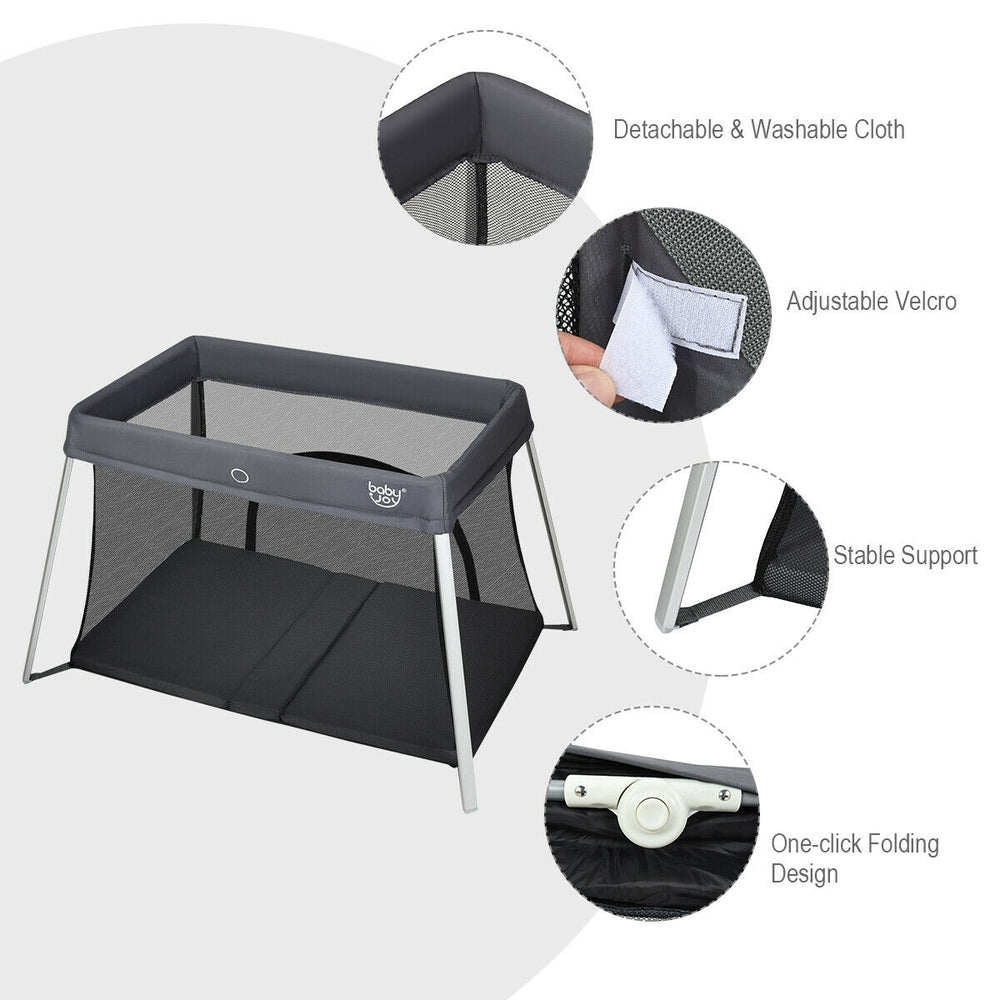 Lightweight foldable baby playpen in dark gray with breathable mesh, detachable fabric, and adjustable zipper for easy.