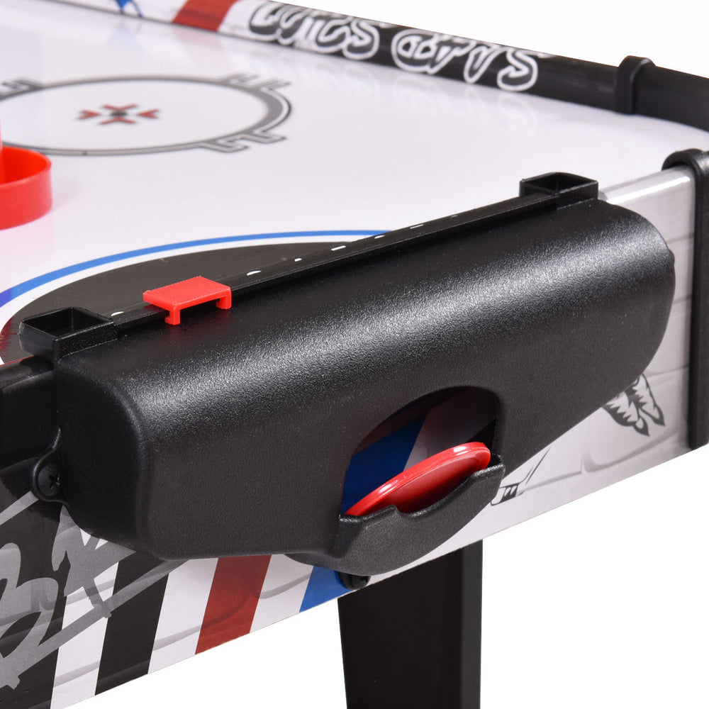 Close-up of the scoring system on a 42-inch air hockey tabletop with pushers and electronic scorer for kids.