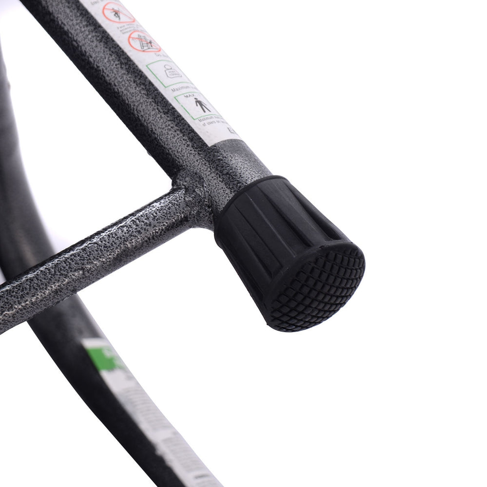 Close-up of the rubber foot of a heavy-duty step stool, featuring a sturdy powder-coated iron construction for safety.