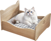 Elevated pet bed frame with ear-shaped headboards and guardrails, perfect for small pets like cats and puppies.