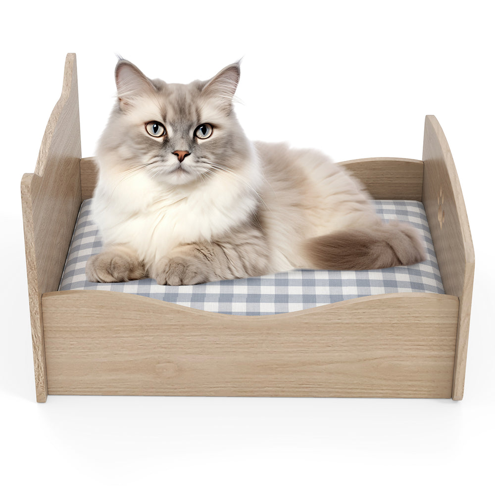 Elevated pet bed frame in walnut with ear-shaped headboards and guardrails, perfect for small pets like cats and.