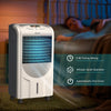 Portable air cooler fan with heater and humidifier, featuring honeycomb cooling, remote control, and 8-hour timer for.