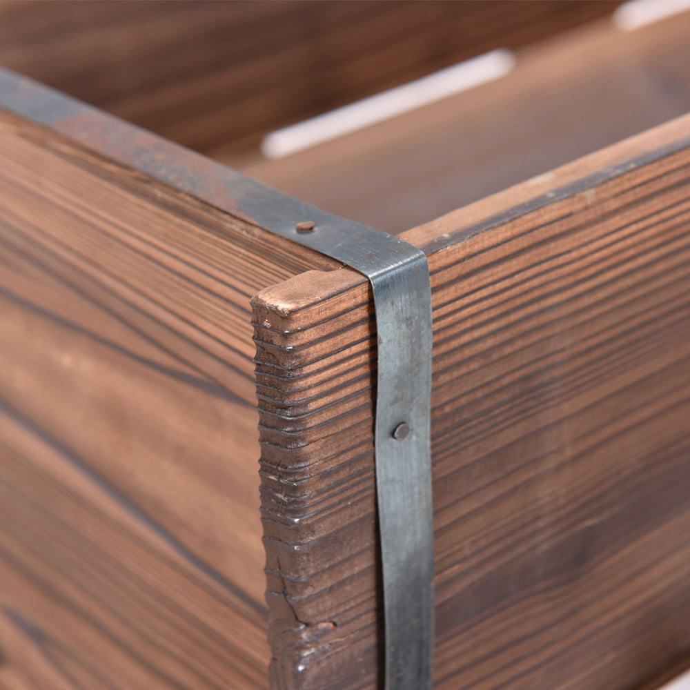 Close-up of the Wood Wagon Planter Pot Stand with Wheels, featuring solid fir wood and rustic metal accents for outdoor.
