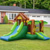 Kids inflatable jungle bounce house with slides and climbing wall, made of durable PVC fabric for outdoor fun.