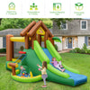 Kids inflatable jungle bounce house with a slide and climbing wall, suitable for up to 3 children aged 3-10 for outdoor.