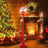 Festive 68-inch red street lamp post with a snow globe lantern, featuring colorful lights and a Christmas scene.