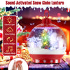 Sound-activated snow globe lantern with colorful lights and falling snow, featuring a festive Christmas scene for.