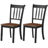Set of 2 solid black spindle back dining chairs with rubber wood seats, ideal for dining rooms and kitchens.