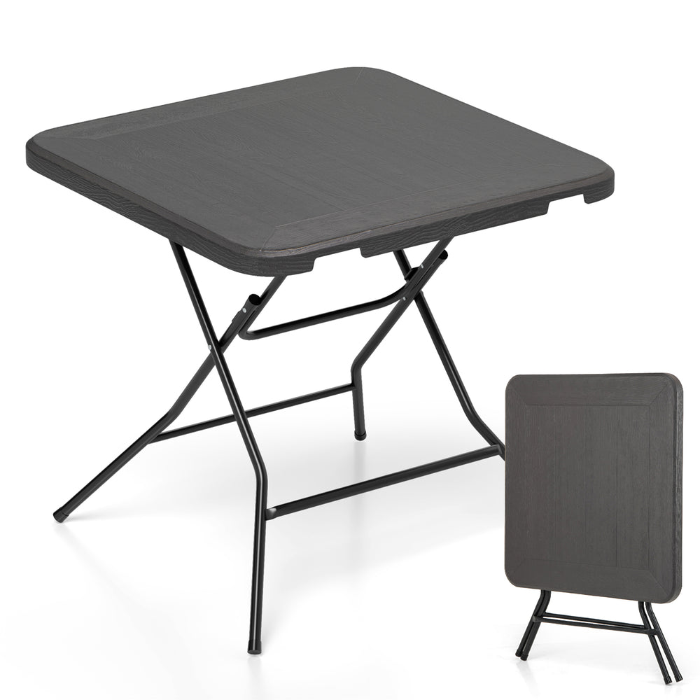 Foldable 2.6FT dining table with wood grain HDPE surface, non-slip foot pads, ideal for indoor or outdoor use.