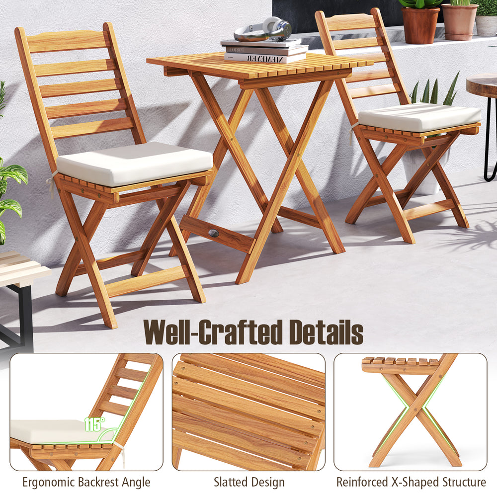 Folding chair table set featuring premium acacia wood, soft seat cushions, and slatted design for outdoor comfort.