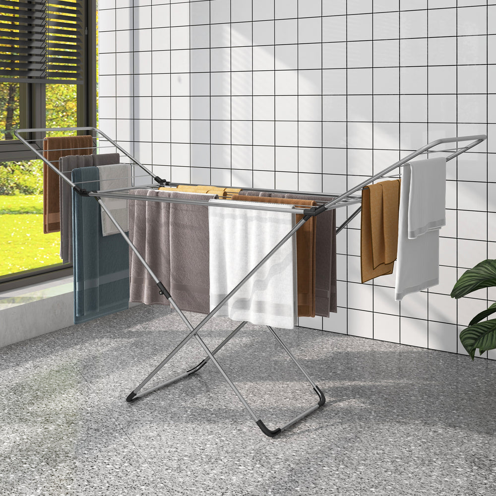Folding clothes drying rack with adjustable wings, sturdy aluminum, ideal for indoor and outdoor use, perfect for.