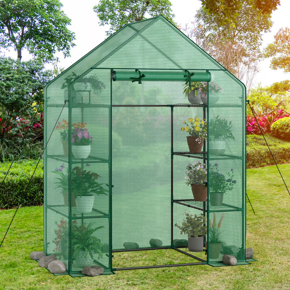 Portable 4 tier walk-in plant greenhouse with 8 shelves, designed for optimal sunlight and plant growth in your garden.