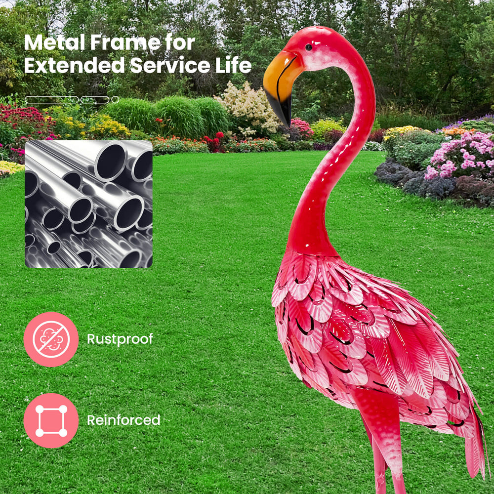 Colorful flamingo garden statue with rustproof metal frame and detailed feathers, perfect for backyard decoration.
