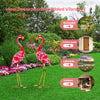Two-piece flamingo garden statue set made of rustproof metal, ideal for backyard and outdoor decoration.