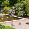 Set of 2 standing metal crane garden statues with delicate feather design, perfect for backyard decoration.