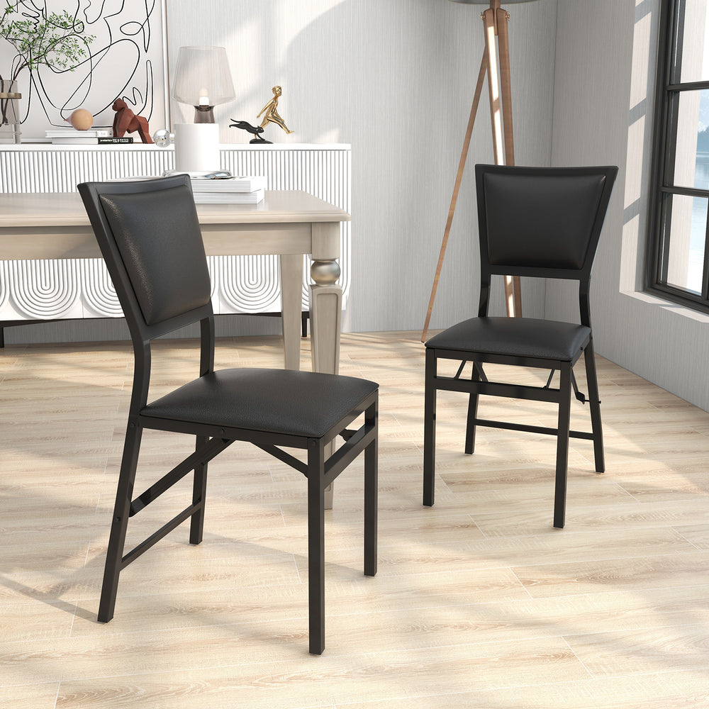 Set of 2 black metal folding dining chairs with ergonomic design, ideal for space-saving in dining or living areas.